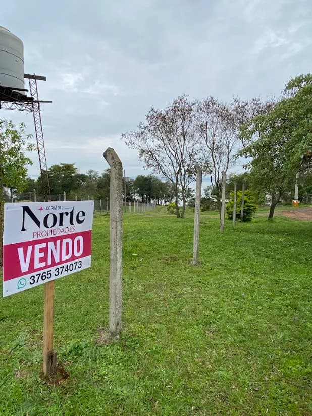 Terreno en venta con cartel inmobiliario