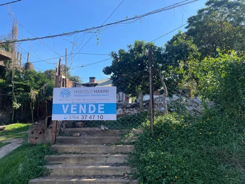 Terreno en venta con cartel inmobiliario