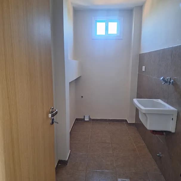 Espacio de lavadero con pileta