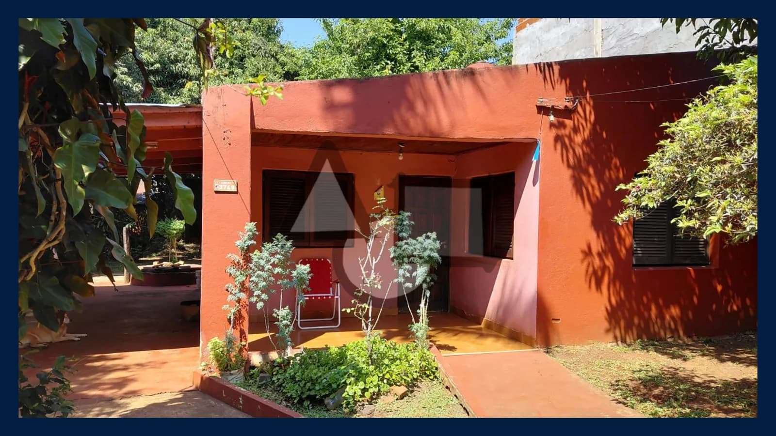 Casa de una planta con porche